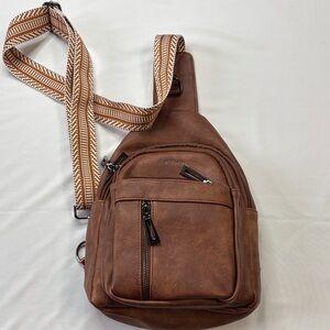 Elegant Brown Crossbody Bag with Patterned Strap